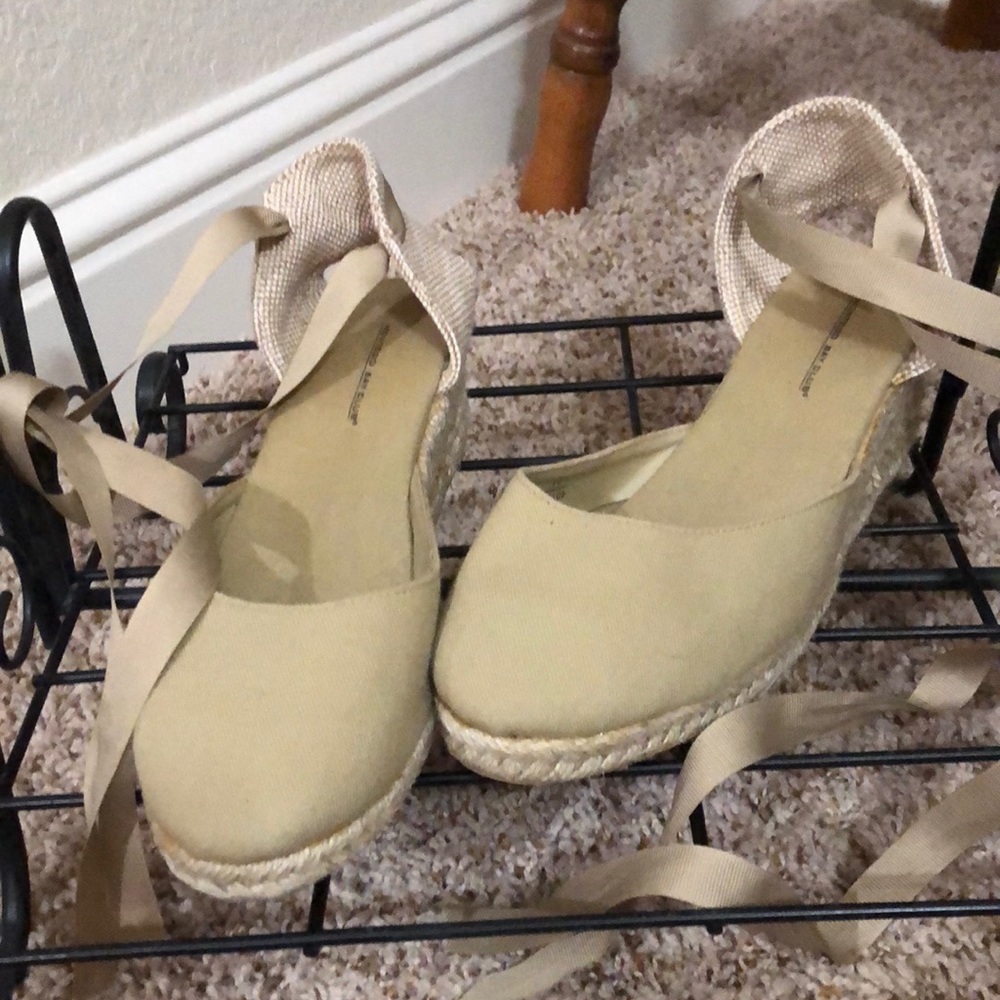 8.5-9 tan Espadrilles. Super cute and soft. Worn on a cruise and then put away.